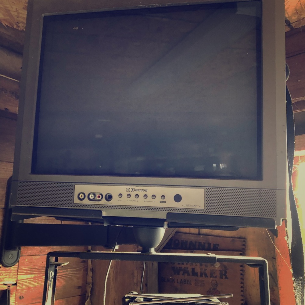 Vintage 1980s television, wall mount and antenna